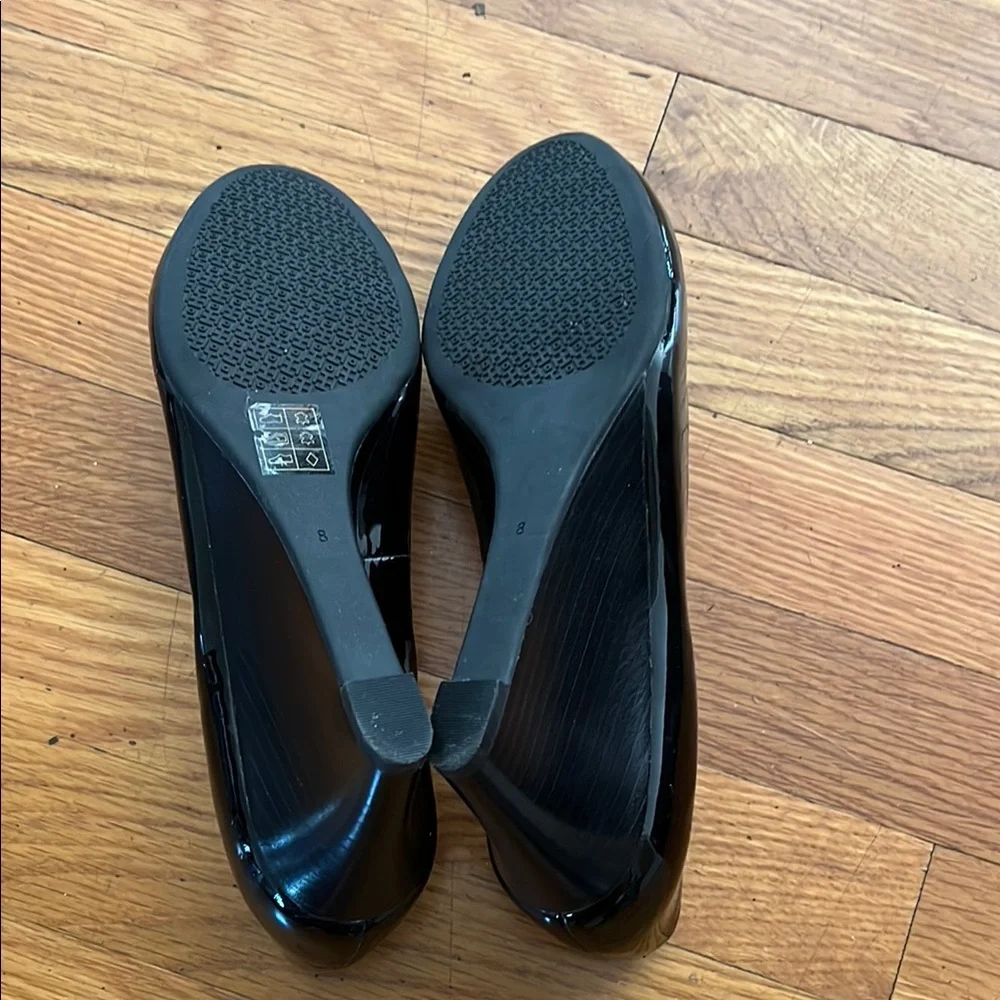 Tory Burch Black Patent Logo Cap-Toe Heels with Gold Trim